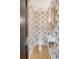 Stylish powder room with eye-catching wallpaper, modern fixtures, and a sleek sink at 299 Bampfield Dr, Mount Pleasant, SC 29464