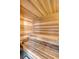 The warm, inviting sauna with wooden benches offers a relaxing spa-like experience at home at 299 Bampfield Dr, Mount Pleasant, SC 29464