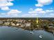 Aerial view of waterfront homes with private docks, surrounded by lush greenery in a charming coastal community at 3034 Maritime Forest Dr, Johns Island, SC 29455