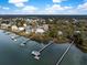 An aerial view showcases waterfront homes with docks in this beautiful community at 3034 Maritime Forest Dr, Johns Island, SC 29455