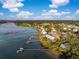 Stunning aerial view of waterfront homes with private docks along the tranquil shoreline at 3034 Maritime Forest Dr, Johns Island, SC 29455