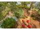 Aerial view of backyard with fire pit, chairs, and an outdoor gathering space at 3034 Maritime Forest Dr, Johns Island, SC 29455