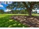 The property offers lush green fairways with mature trees providing shade along the golf course at 3034 Maritime Forest Dr, Johns Island, SC 29455