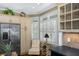Bright eat-in kitchen featuring stainless steel appliances and a bay window with charming shutters at 3034 Maritime Forest Dr, Johns Island, SC 29455