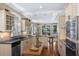 Charming kitchen featuring a peninsula, stainless appliances, and seamless flow into the living area at 3034 Maritime Forest Dr, Johns Island, SC 29455