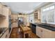 Bright and airy kitchen with stainless steel appliances, hardwood floors, and lots of natural light at 3034 Maritime Forest Dr, Johns Island, SC 29455