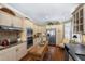 Bright kitchen featuring custom cabinets, stainless steel appliances, and hardwood floors at 3034 Maritime Forest Dr, Johns Island, SC 29455