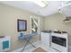 Functional laundry room with modern washer and dryer, utility sink and natural light at 3034 Maritime Forest Dr, Johns Island, SC 29455