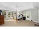 Spacious main bedroom with balcony access, tray ceilings, and en suite bathroom at 3034 Maritime Forest Dr, Johns Island, SC 29455
