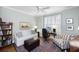 Cozy office space with comfortable seating and natural light from shuttered windows at 3034 Maritime Forest Dr, Johns Island, SC 29455