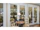 Enclosed porch area perfect for entertaining or relaxing with serene lake views at 3034 Maritime Forest Dr, Johns Island, SC 29455