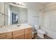Bathroom with wood cabinets, large mirror, and tub-shower combo at 312 White Gables Dr, Summerville, SC 29483