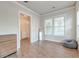 Bright and airy bedroom with wood floors, a full-length mirror, and a cozy beanbag chair at 312 White Gables Dr, Summerville, SC 29483