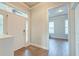 Bright foyer with wood-look flooring, white trim, and an open view to the adjacent room at 312 White Gables Dr, Summerville, SC 29483