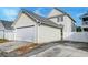 Detached garage with white door and driveway at 312 White Gables Dr, Summerville, SC 29483