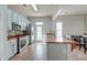 Bright kitchen featuring stainless steel appliances, wood countertops, and an island overlooking the living area at 312 White Gables Dr, Summerville, SC 29483