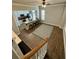 Open living area flows into a modern kitchen with a large island and updated appliances at 312 White Gables Dr, Summerville, SC 29483