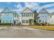 Colorful street showcasing picturesque homes with tidy lawns and brick-lined paths under a bright sky at 312 White Gables Dr, Summerville, SC 29483