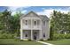 Charming two-story home with double porches, columns, and a well-manicured lawn at 318 Archar St, Summerville, SC 29486