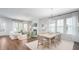 Open concept living space featuring dining area, living room, and lots of natural light at 318 Archar St, Summerville, SC 29486