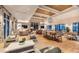 Spacious lounge area with modern furniture, wood floors, and elegant light fixtures at 318 Archar St, Summerville, SC 29486