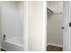 Clean bathroom featuring a shower-tub combination and a closet, providing practical space at 319 Bluebell Ave, Summerville, SC 29483