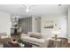 Inviting living room with hardwood floors, neutral decor, and an open layout connecting to the dining area at 319 Bluebell Ave, Summerville, SC 29483