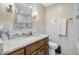 Bathroom with modern dark wood cabinets, granite counters and tile backsplash, and fixtures at 32 Monte Sano Dr, Hanahan, SC 29410