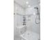 Bathroom featuring a walk-in shower with seamless glass door, built-in bench, and mosaic tile accents at 32 Monte Sano Dr, Hanahan, SC 29410