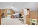 Cozy bedroom on the third floor featuring a bed, desk, and laundry room at 32 Monte Sano Dr, Hanahan, SC 29410