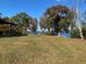 Scenic view of the community park with a picnic shelter and lake access on a bright, sunny day at 32 Monte Sano Dr, Hanahan, SC 29410