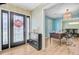 Inviting home foyer with decorative glass front door, modern console table, and gleaming laminate floors at 32 Monte Sano Dr, Hanahan, SC 29410