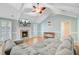 Spacious living room featuring a cozy fireplace and comfortable sectional seating area at 32 Monte Sano Dr, Hanahan, SC 29410