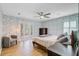 Inviting main bedroom features hardwood floors, ceiling fan, and french doors leading to a balcony at 32 Monte Sano Dr, Hanahan, SC 29410