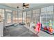 Bright sunroom filled with plenty of natural light and views of the backyard at 32 Monte Sano Dr, Hanahan, SC 29410