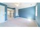 Upstairs bonus room with carpet, closet, and french door access to hallway at 3274 Heathland Way, Mount Pleasant, SC 29466