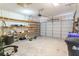 Spacious garage with built in shelving, and room to park cars or create a workshop area at 3274 Heathland Way, Mount Pleasant, SC 29466