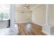 Spacious living room with hardwood floors, ceiling fan and lots of natural light at 3274 Heathland Way, Mount Pleasant, SC 29466