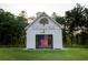 Carolina Park's open white structure with an American flag hanging inside, surrounded by trees and green lawn at 3853 Delinger Dr, Mount Pleasant, SC 29466