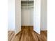 Open white closet with shelving and hardwood floors at 3853 Delinger Dr, Mount Pleasant, SC 29466
