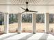 Large covered patio with ceiling fan and backyard views that provides a relaxing outdoor living space at 3853 Delinger Dr, Mount Pleasant, SC 29466