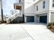 Beautiful home exterior featuring a two-car garage and stairs leading to a covered porch at 3853 Delinger Dr, Mount Pleasant, SC 29466