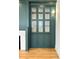 Inviting living room with stylish green built-in shelving and a cozy fireplace at 3853 Delinger Dr, Mount Pleasant, SC 29466