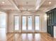 Living room featuring trey ceiling, ceiling fan, hardwood floors, and access to screened in porch at 3853 Delinger Dr, Mount Pleasant, SC 29466