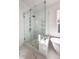 Large walk-in shower features glass doors, subway tile, bench seat, and overhead shower head at 3853 Delinger Dr, Mount Pleasant, SC 29466