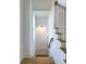 Bright stairway with wooden steps, white risers, and a wooden handrail at 3853 Delinger Dr, Mount Pleasant, SC 29466