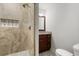 Modern bathroom with stone-tiled shower and updated vanity at 422 Jean Wells Dr, Goose Creek, SC 29445