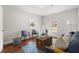 Bright bedroom with hardwood floors, cozy seating, and plenty of natural light at 422 Jean Wells Dr, Goose Creek, SC 29445
