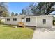 Charming single-story home with a freshly painted exterior and a well-manicured lawn at 422 Jean Wells Dr, Goose Creek, SC 29445