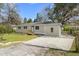Exterior of a home with a concrete driveway and a small porch at 422 Jean Wells Dr, Goose Creek, SC 29445